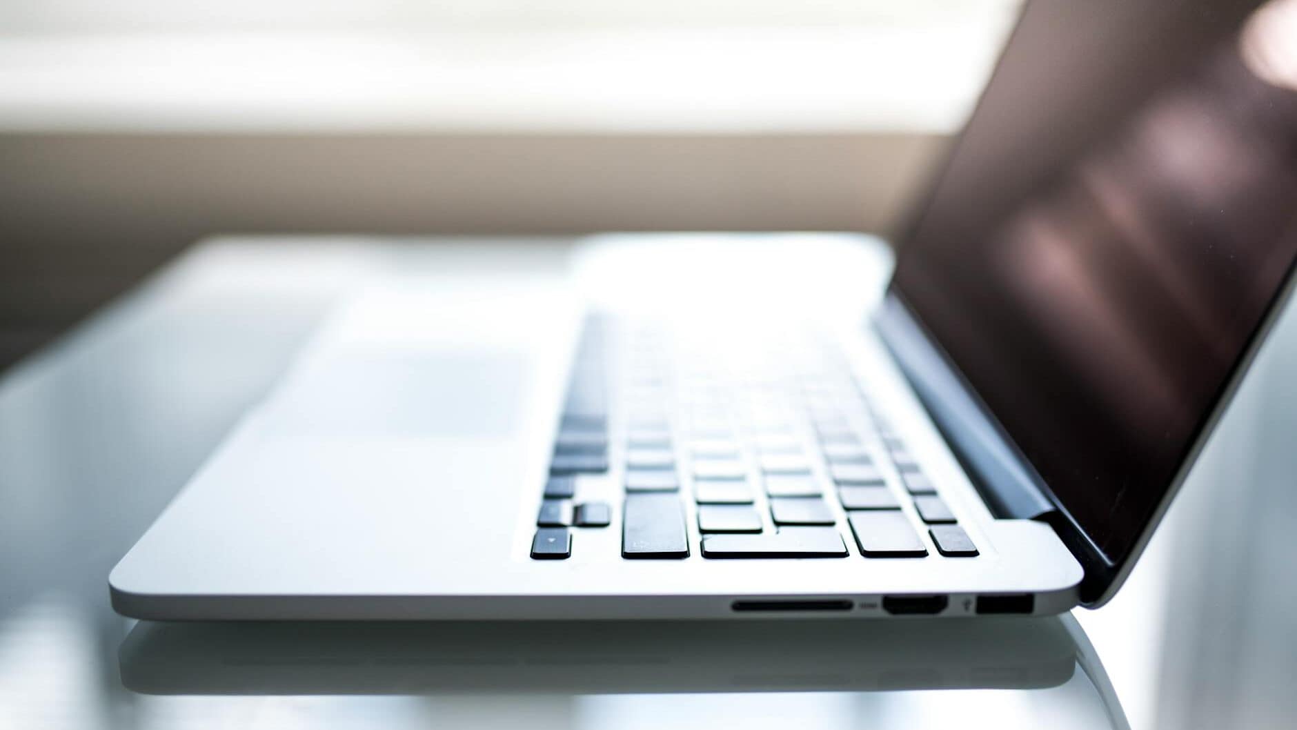 shallow focus photography of macbook