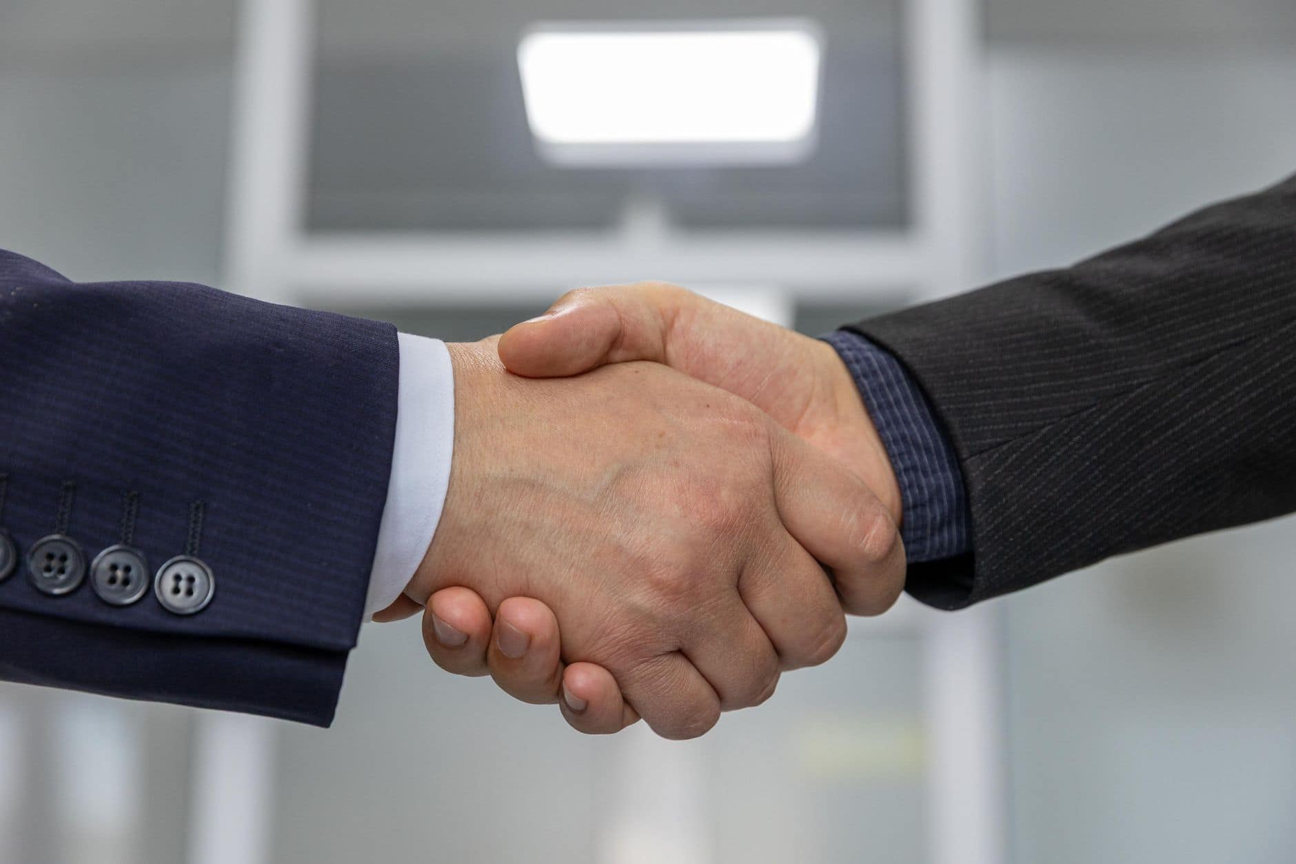 business handshake signifying partnership
